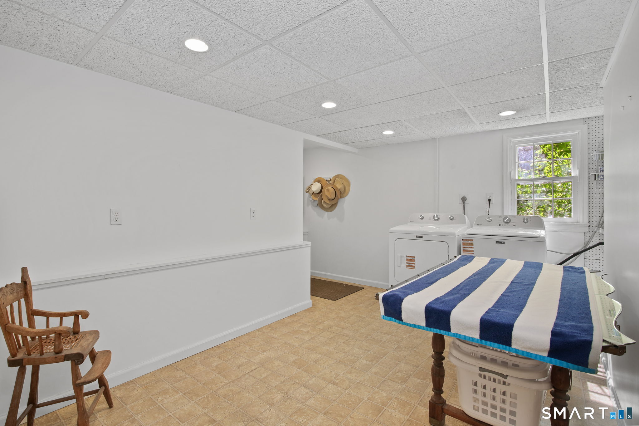 63 Pipers Hill Road Wilton, CT 06897 - Photo 29 of 37 a very nice looking room with a large window
