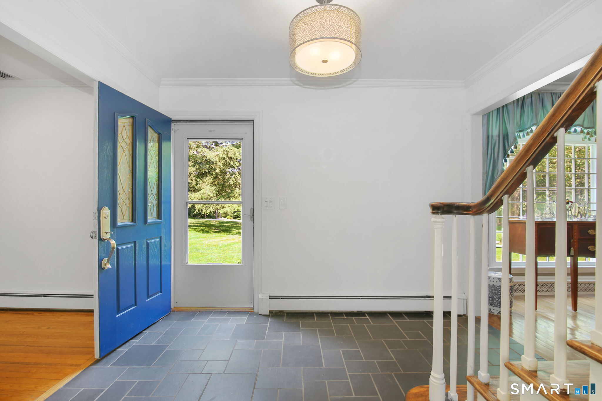 63 Pipers Hill Road Wilton, CT 06897 - Photo 6 of 37 a view of an entryway with wooden floor