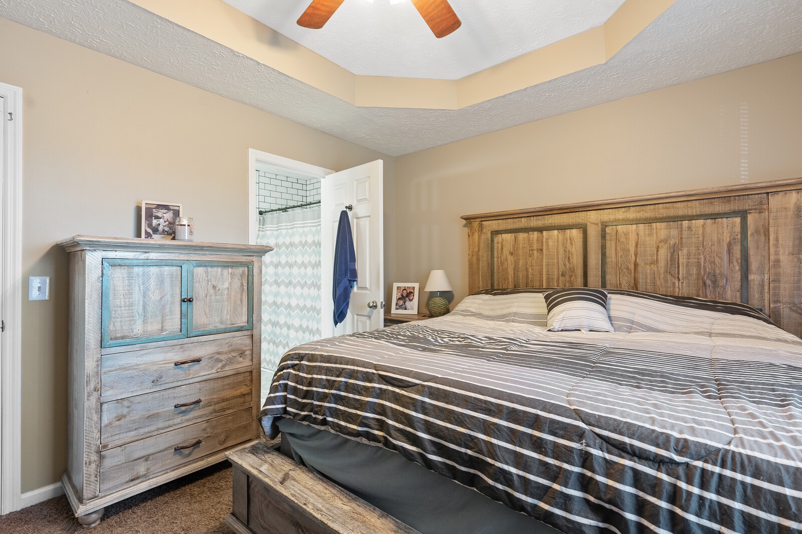 155 Smith Road Portland, TN 37148 - Photo 14 of 24 a bedroom with a bed and a dresser