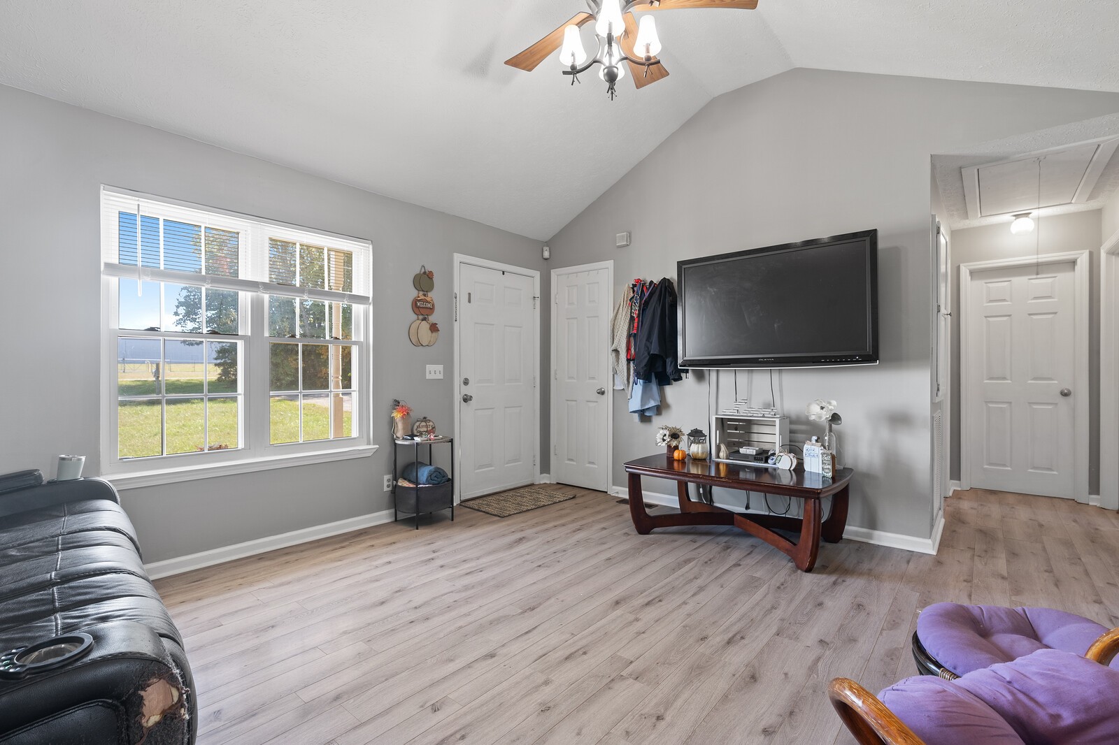 155 Smith Road Portland, TN 37148 - Photo 3 of 24 a living room with furniture and a flat screen tv
