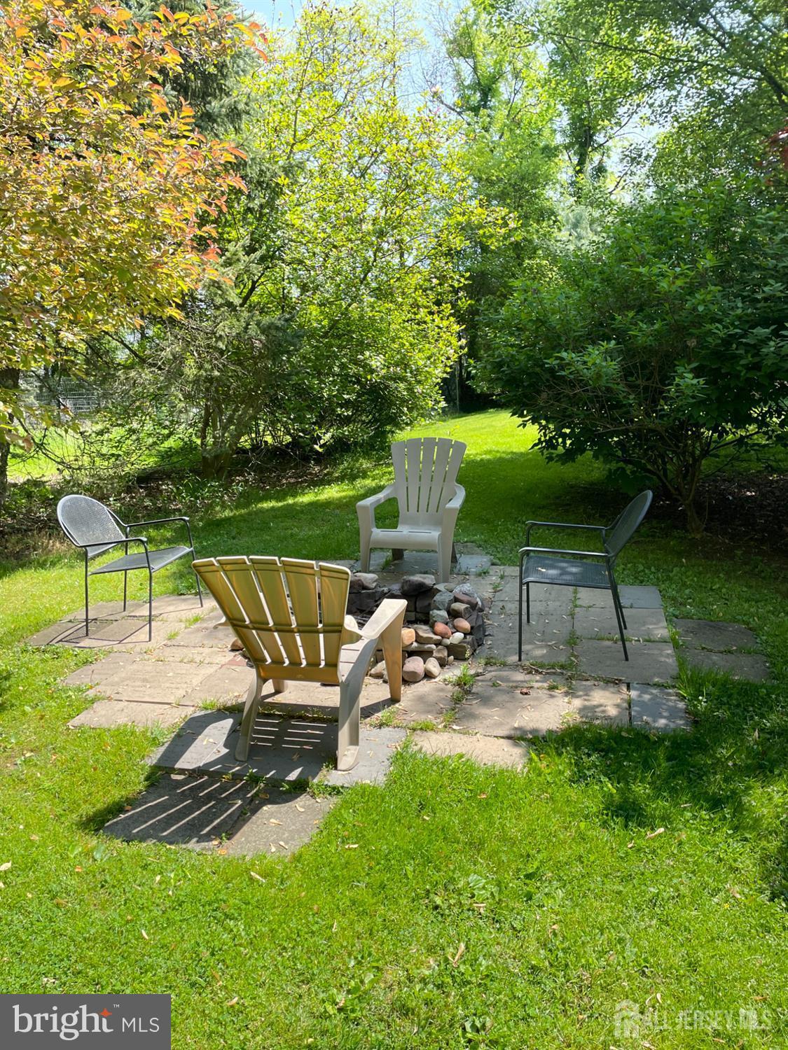 181 Disbrow Hill Road Monroe Township, NJ 08831 - Photo 12 of 21 a view of a chairs and table in the garden