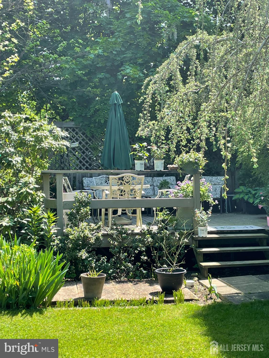 181 Disbrow Hill Road Monroe Township, NJ 08831 - Photo 16 of 21 a view of a garden with sitting area