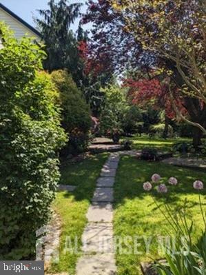 181 Disbrow Hill Road Monroe Township, NJ 08831 - Photo 18 of 21 a view of a lake view with a fountain