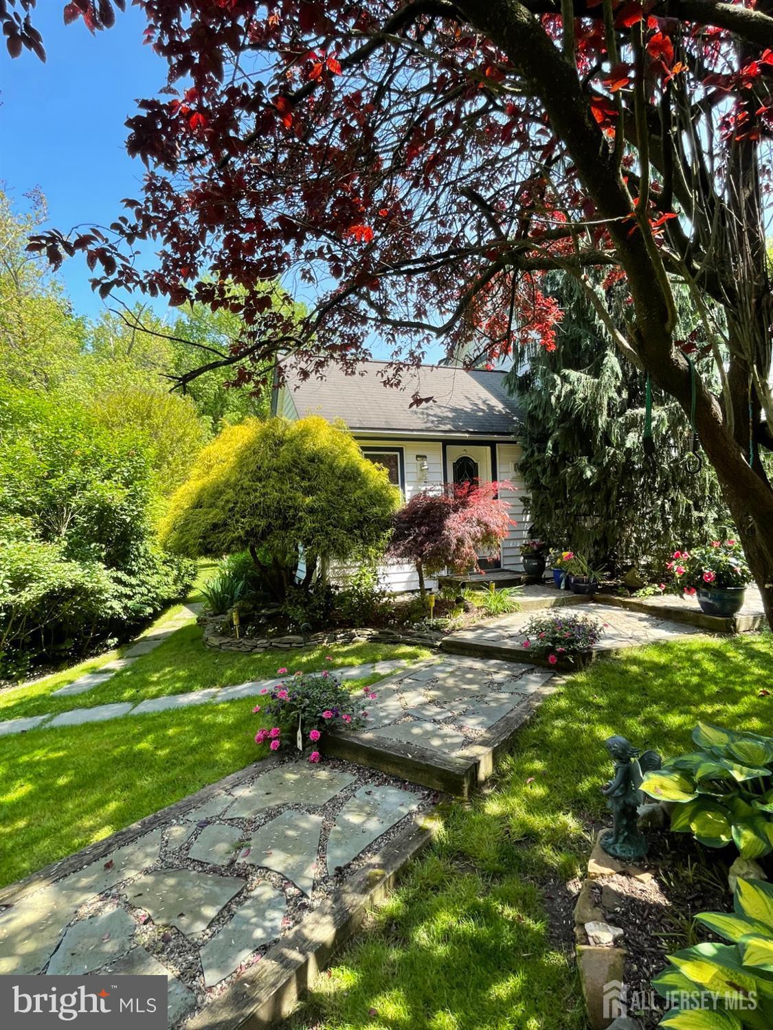 181 Disbrow Hill Road Monroe Township, NJ 08831 - Photo 3 of 21 a view of swimming pool is middle in the garden