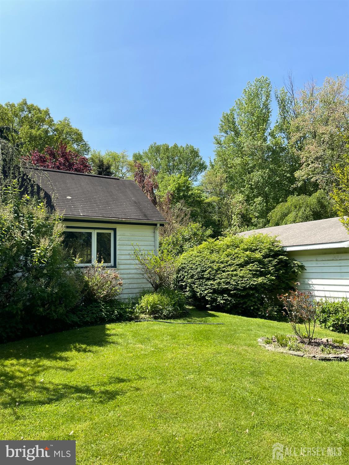 181 Disbrow Hill Road Monroe Township, NJ 08831 - Photo 5 of 21 a view of a house with garden