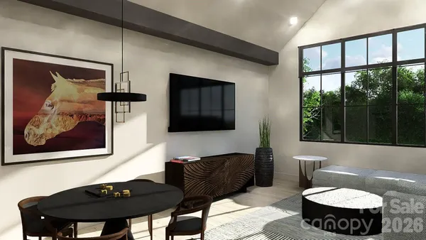 a living room with furniture and wall painting