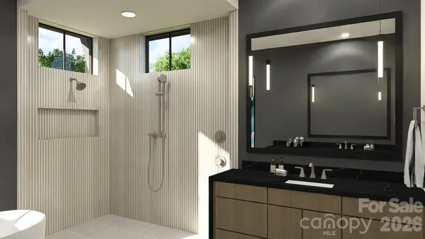 a bathroom with a sink vanity granite and a mirror