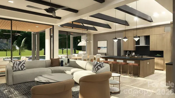 a living room with furniture a large window and a chandelier