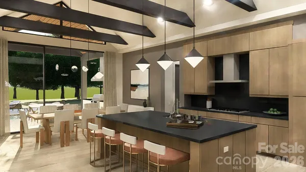 a kitchen with a table chairs and a grill