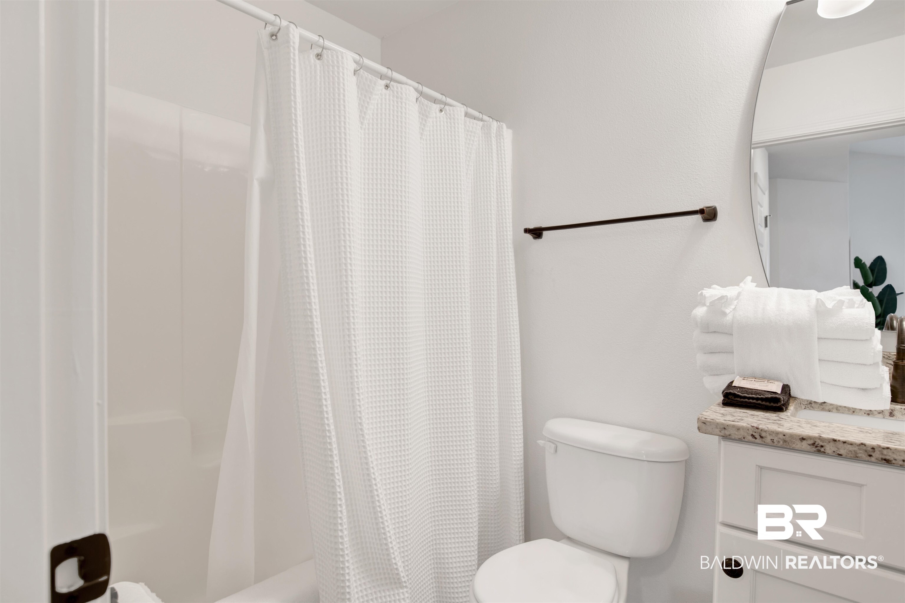 4012 Kendallbrook Loop Foley, AL 36535 - Photo 21 of 31 Full bathroom featuring vanity and shower / tub combo with curtain