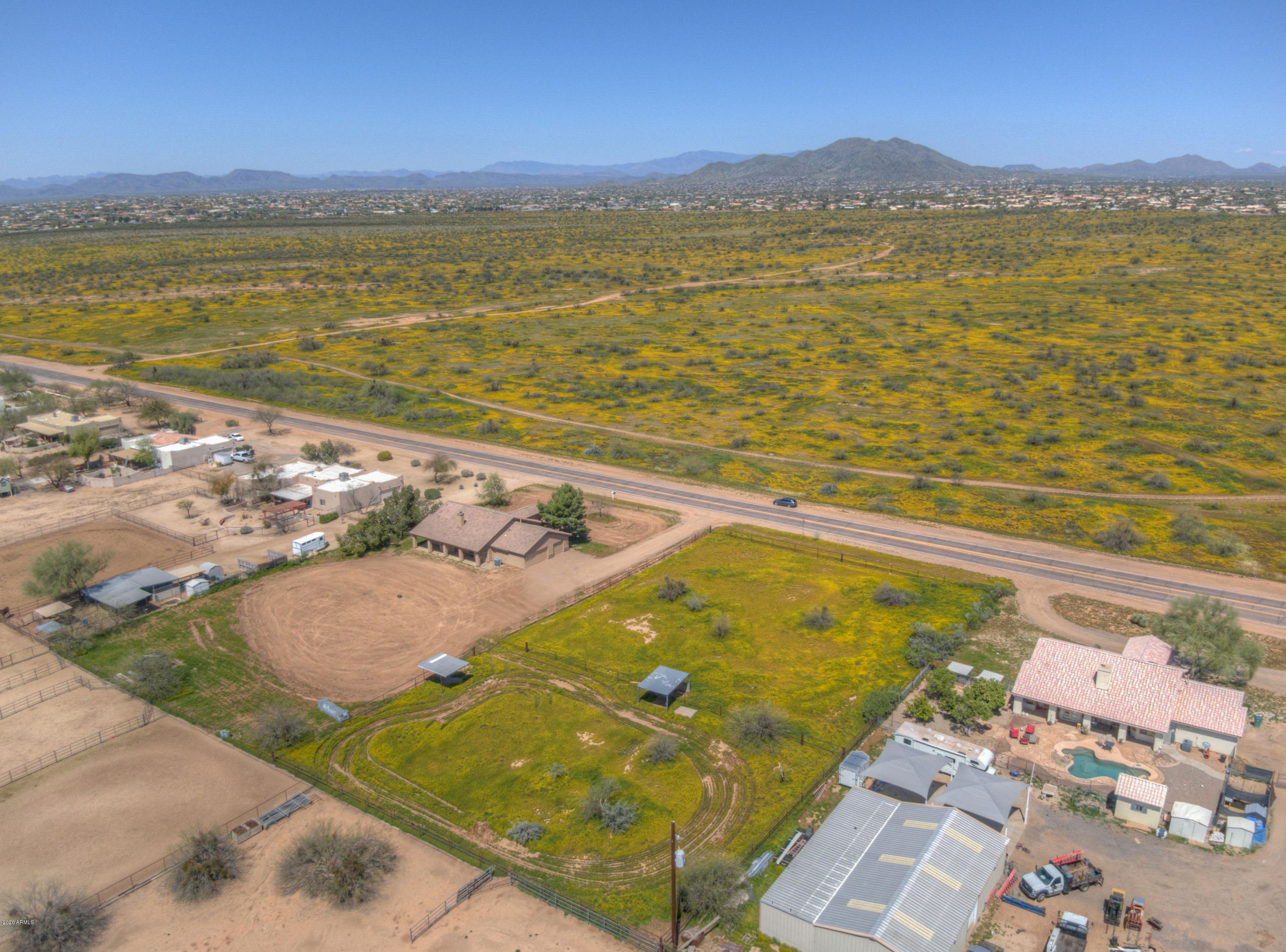 Home & two acres across from state land!