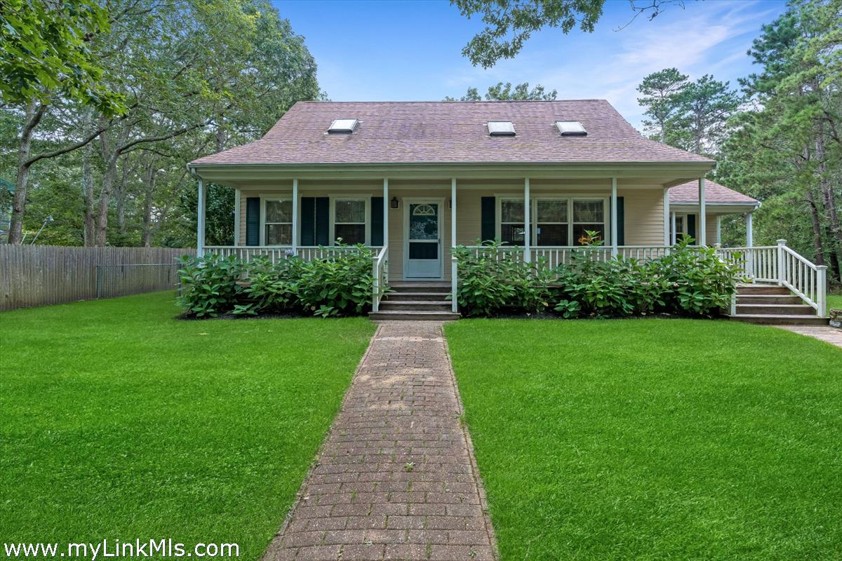 2 Farm Path Road Oak Bluffs, MA 02557 - Photo 1 of 37 a front view of a house with garden
