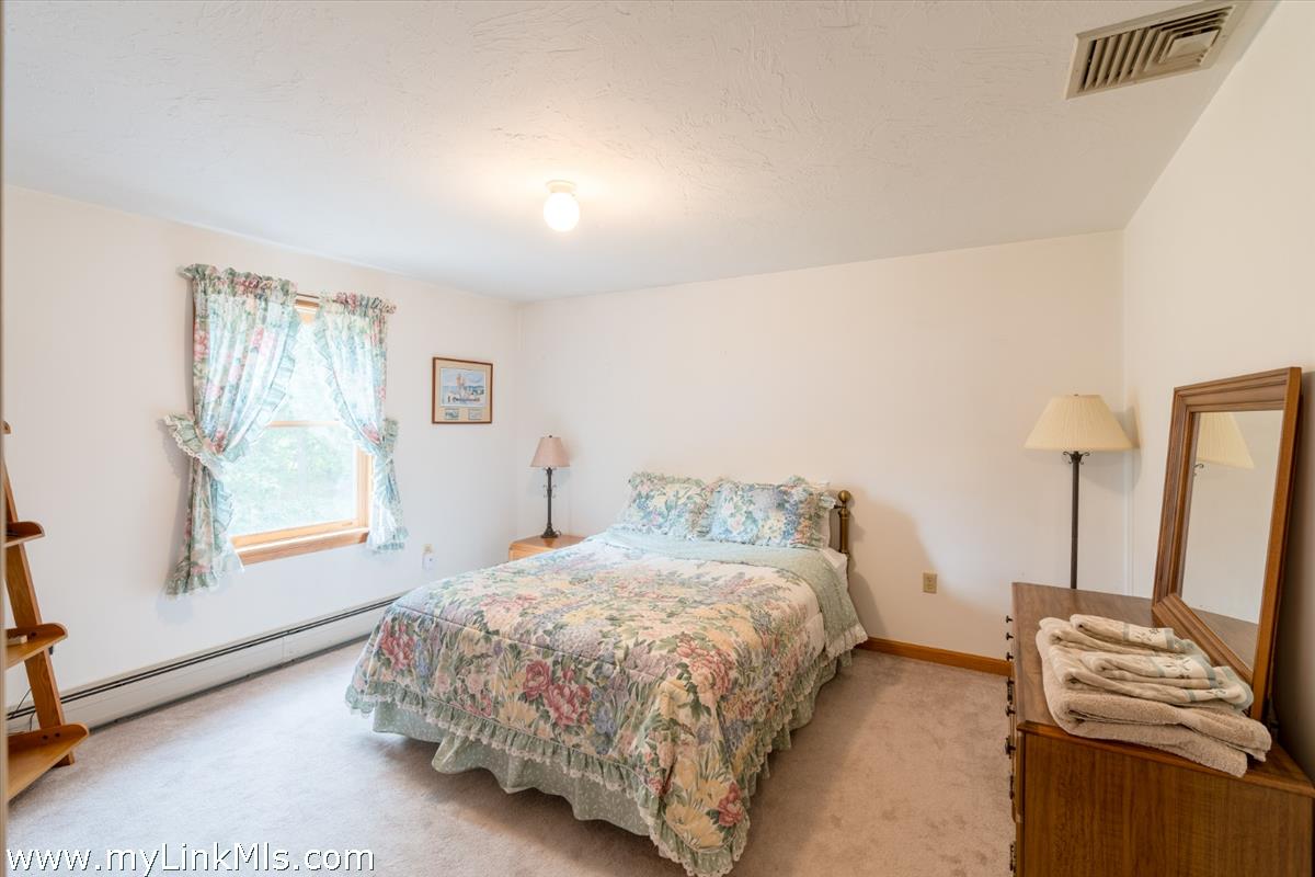 2 Farm Path Road Oak Bluffs, MA 02557 - Photo 20 of 37 a bedroom with a bed and a window