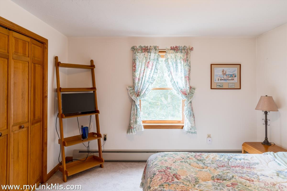 2 Farm Path Road Oak Bluffs, MA 02557 - Photo 21 of 37 a bedroom with bed and a window