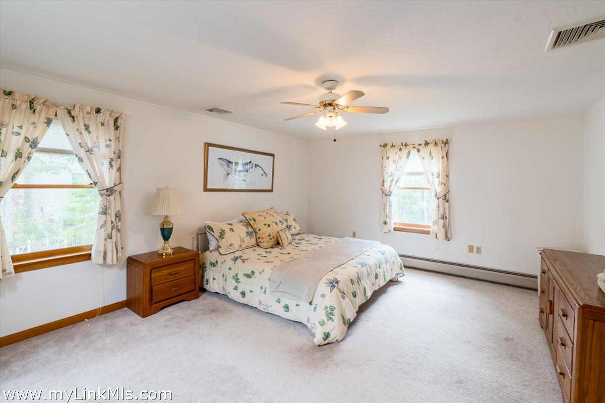 2 Farm Path Road Oak Bluffs, MA 02557 - Photo 23 of 37 a bedroom with a bed furniture and a window