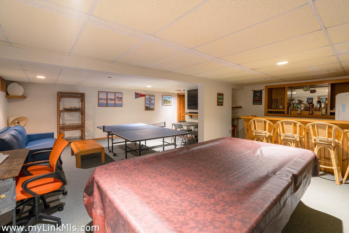 2 Farm Path Road Oak Bluffs, MA 02557 - Photo 25 of 37 a bedroom with furniture and wooden floor