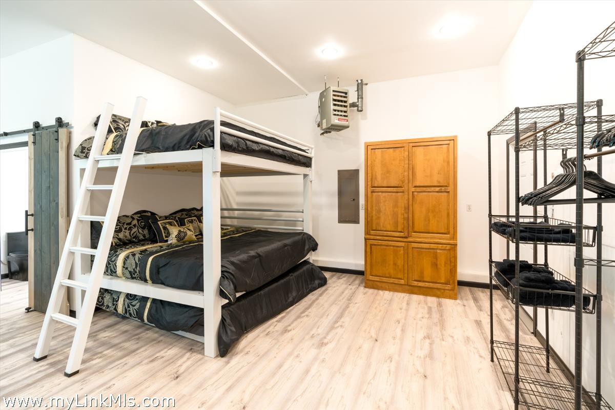 2 Farm Path Road Oak Bluffs, MA 02557 - Photo 33 of 37 a bedroom with furniture and a window