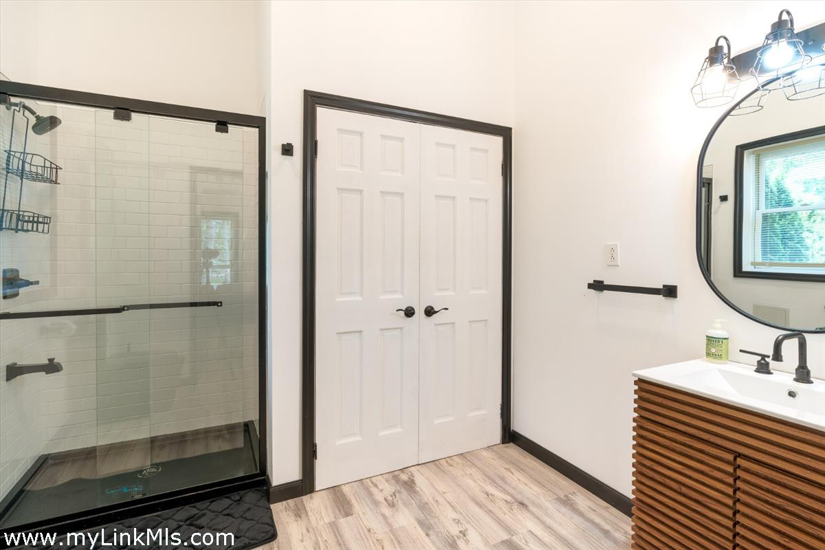 2 Farm Path Road Oak Bluffs, MA 02557 - Photo 36 of 37 a bathroom with a sink and a mirror