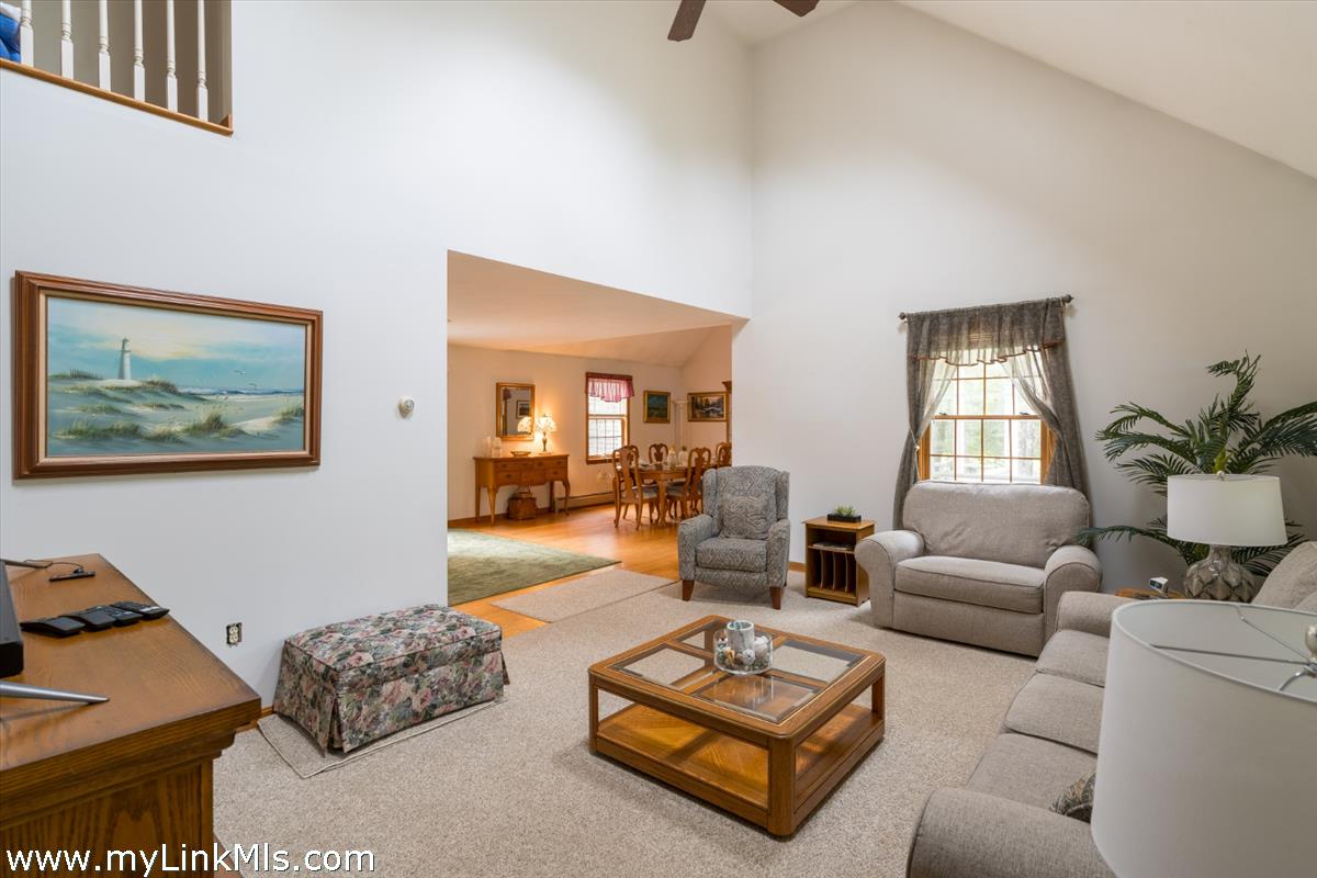 2 Farm Path Road Oak Bluffs, MA 02557 - Photo 6 of 37 a living room with furniture rug and window