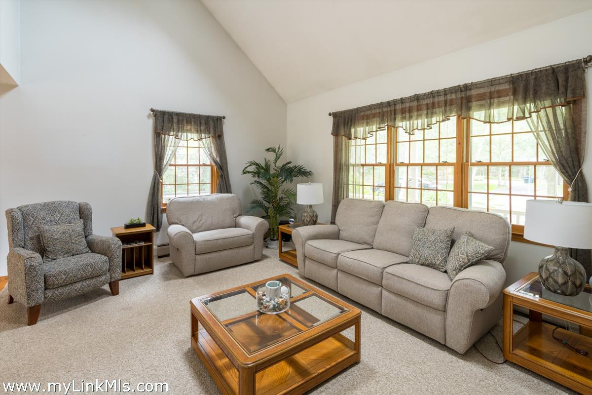 2 Farm Path Road Oak Bluffs, MA 02557 - Photo 7 of 37 a living room with furniture and a large window
