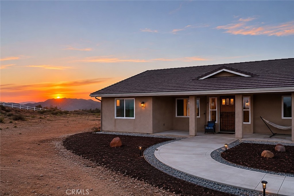 12451 Rancho Heights Road Pala, CA 92059 - Photo 42 of 46 a front view of a house with yard and balcony