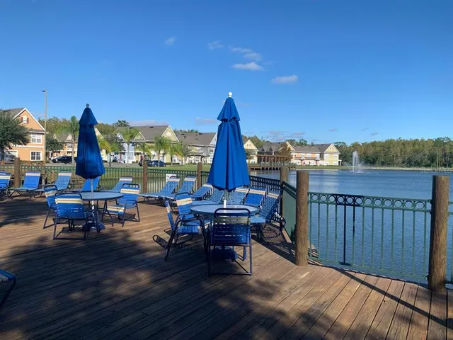 a view of a terrace with furniture