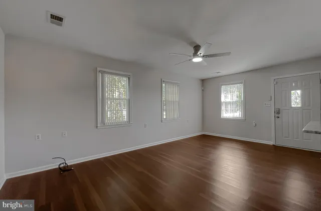 a bathroom with a toilet sink and shower