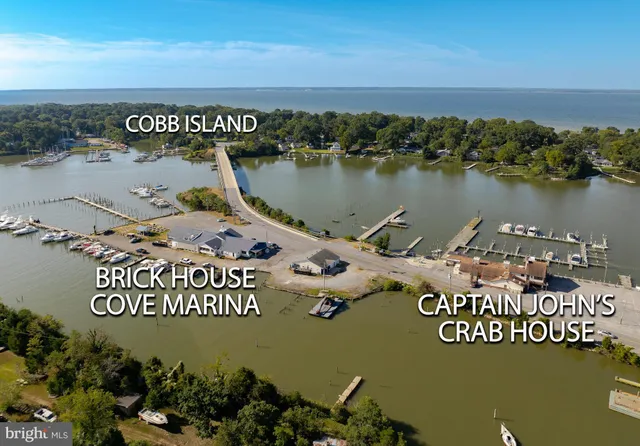 a kitchen with stainless steel appliances a refrigerator and a stove top oven