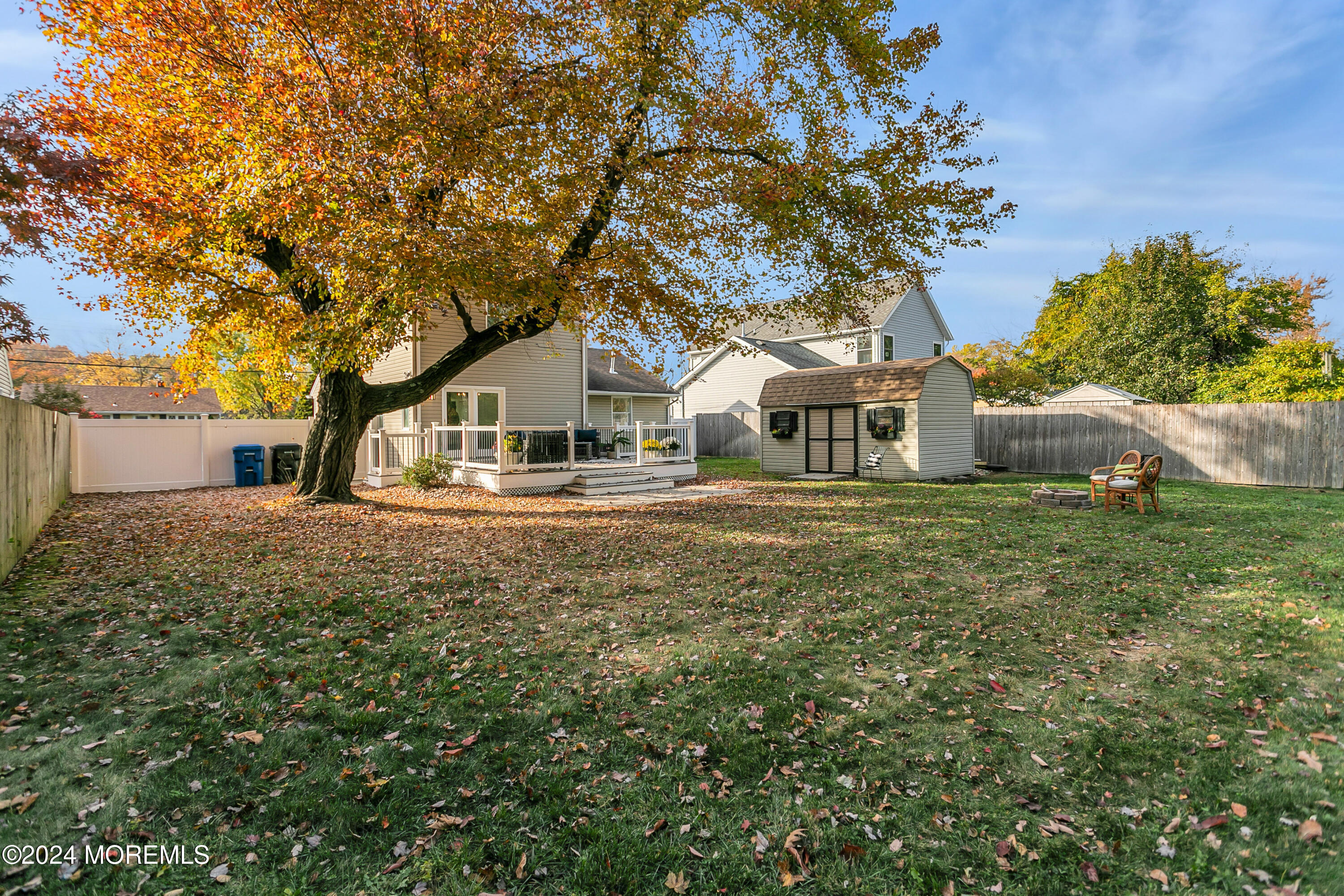 651 Hopping Road Belford, NJ 07718 - Photo 54 of 66 a front view of a house with garden