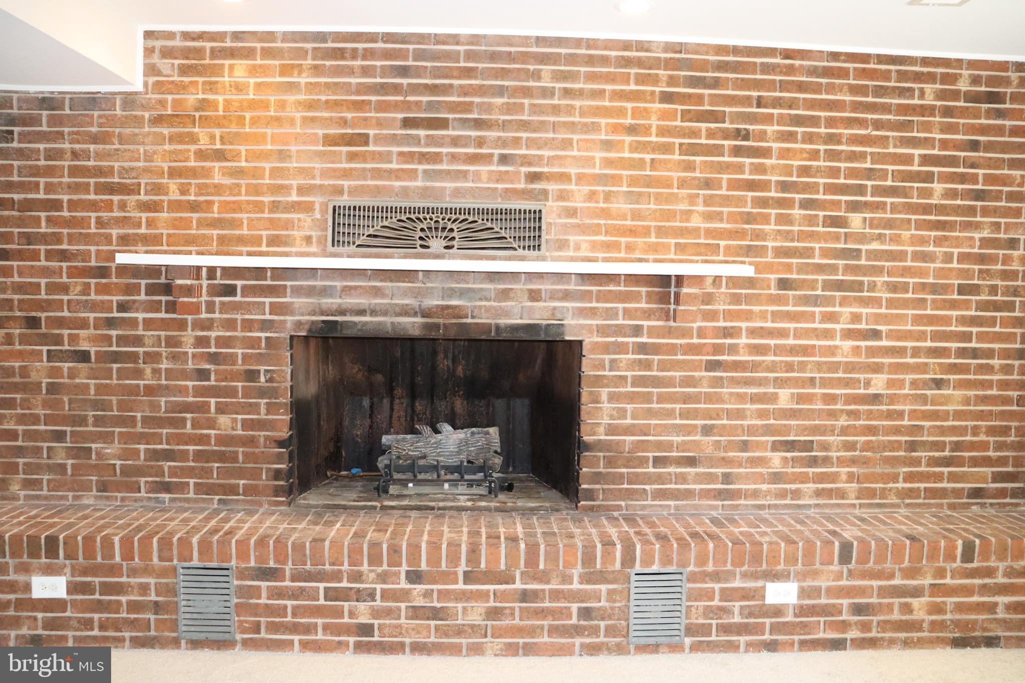 8918 Burwell Road Nokesville, VA 20181 - Photo 20 of 29 Cozy second family room with with brick fireplace