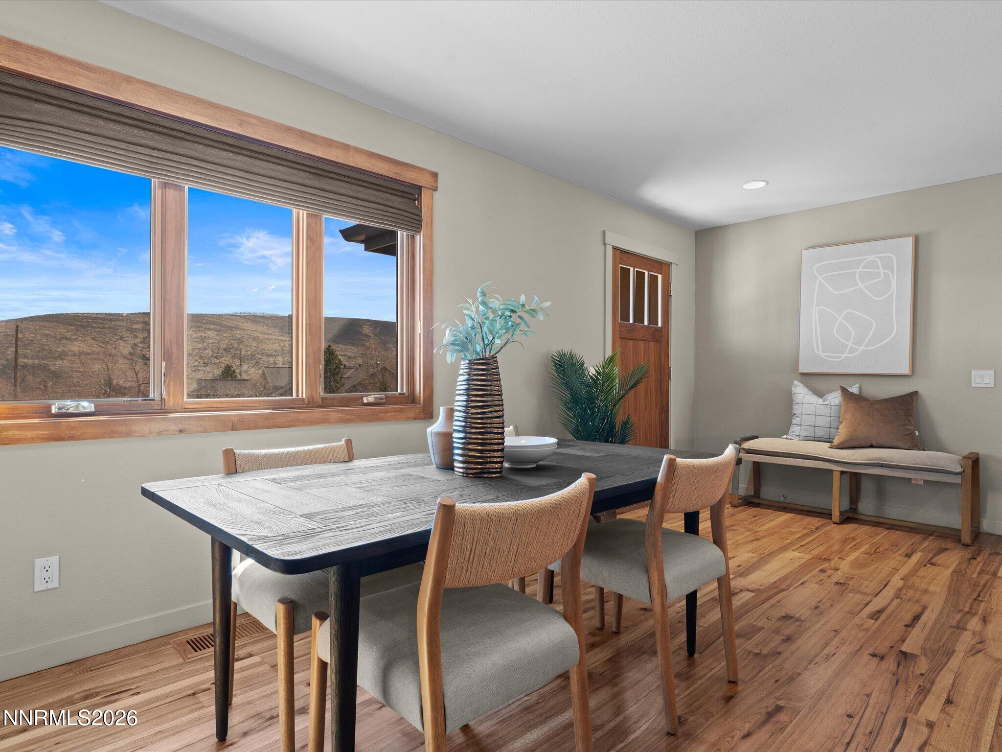 20 Connie Way Reno, NV 89521 - Photo 11 of 69 a view of a dining room with furniture window and outside view