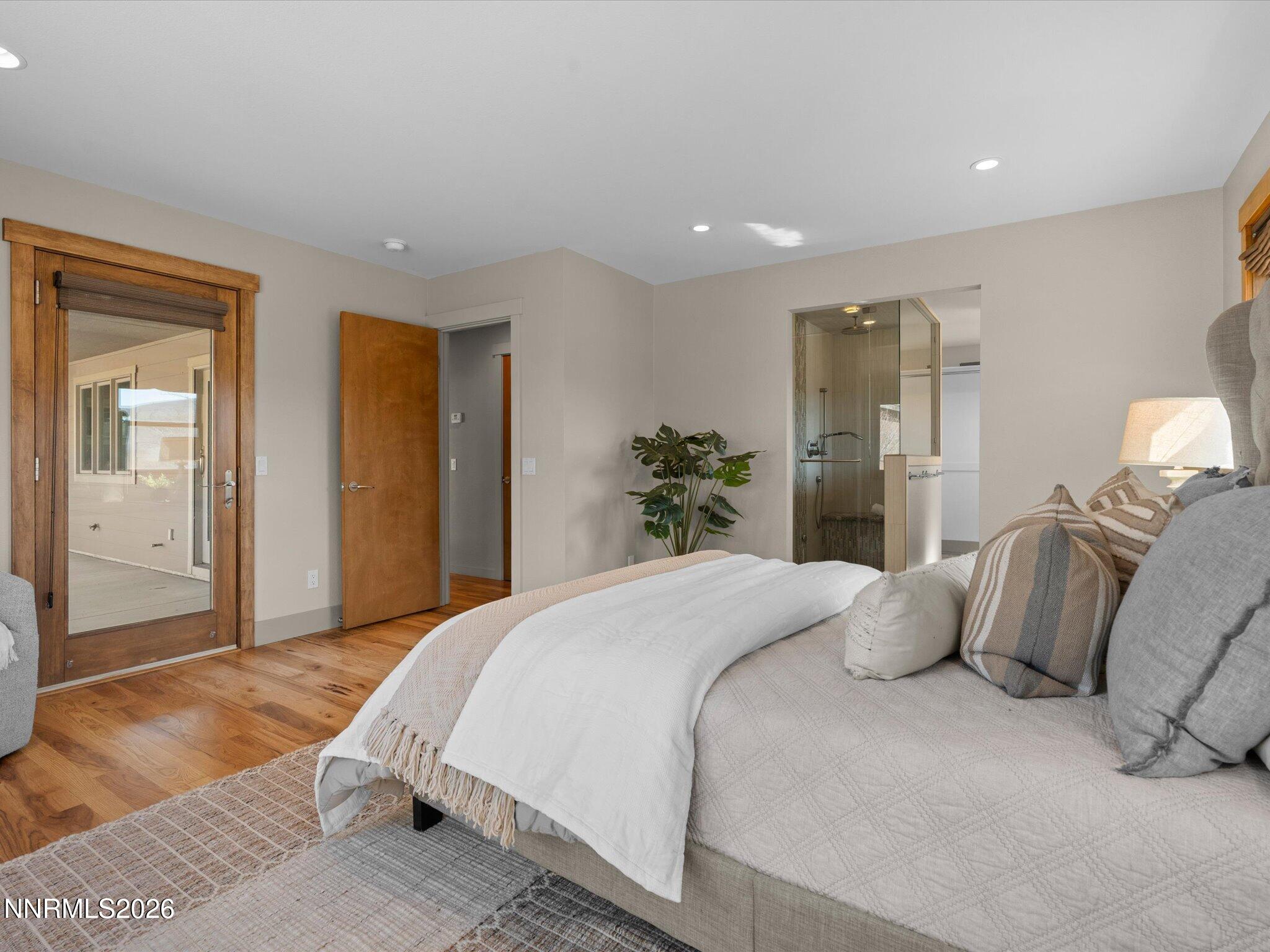 20 Connie Way Reno, NV 89521 - Photo 24 of 69 a bedroom with a bed and a lamp