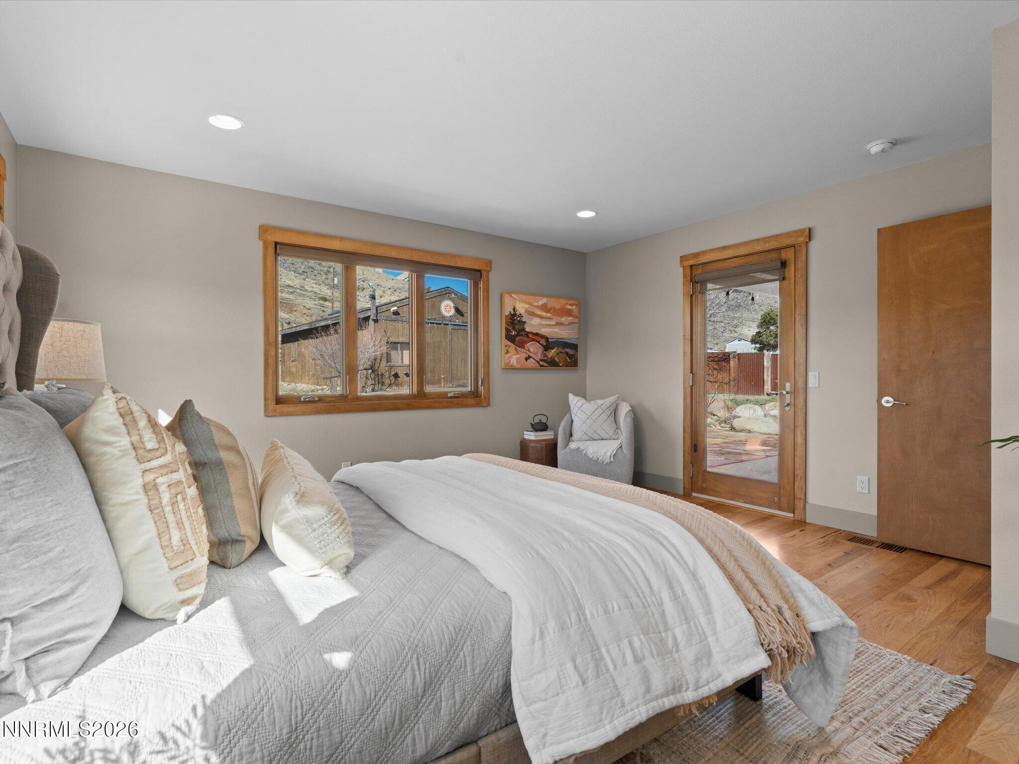 20 Connie Way Reno, NV 89521 - Photo 25 of 69 a bedroom with a large bed and a window