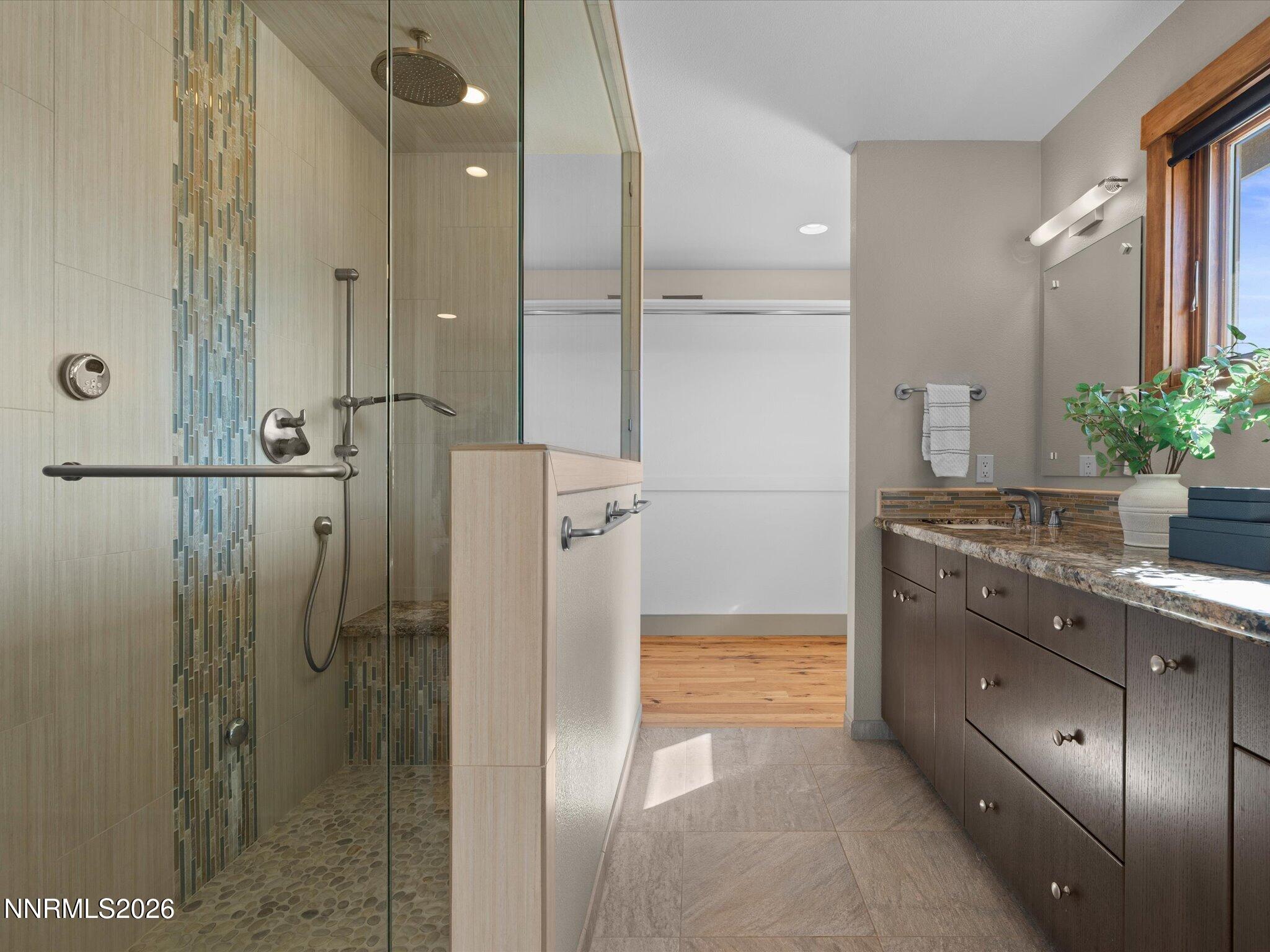 20 Connie Way Reno, NV 89521 - Photo 26 of 69 a bathroom with a shower sink and mirror