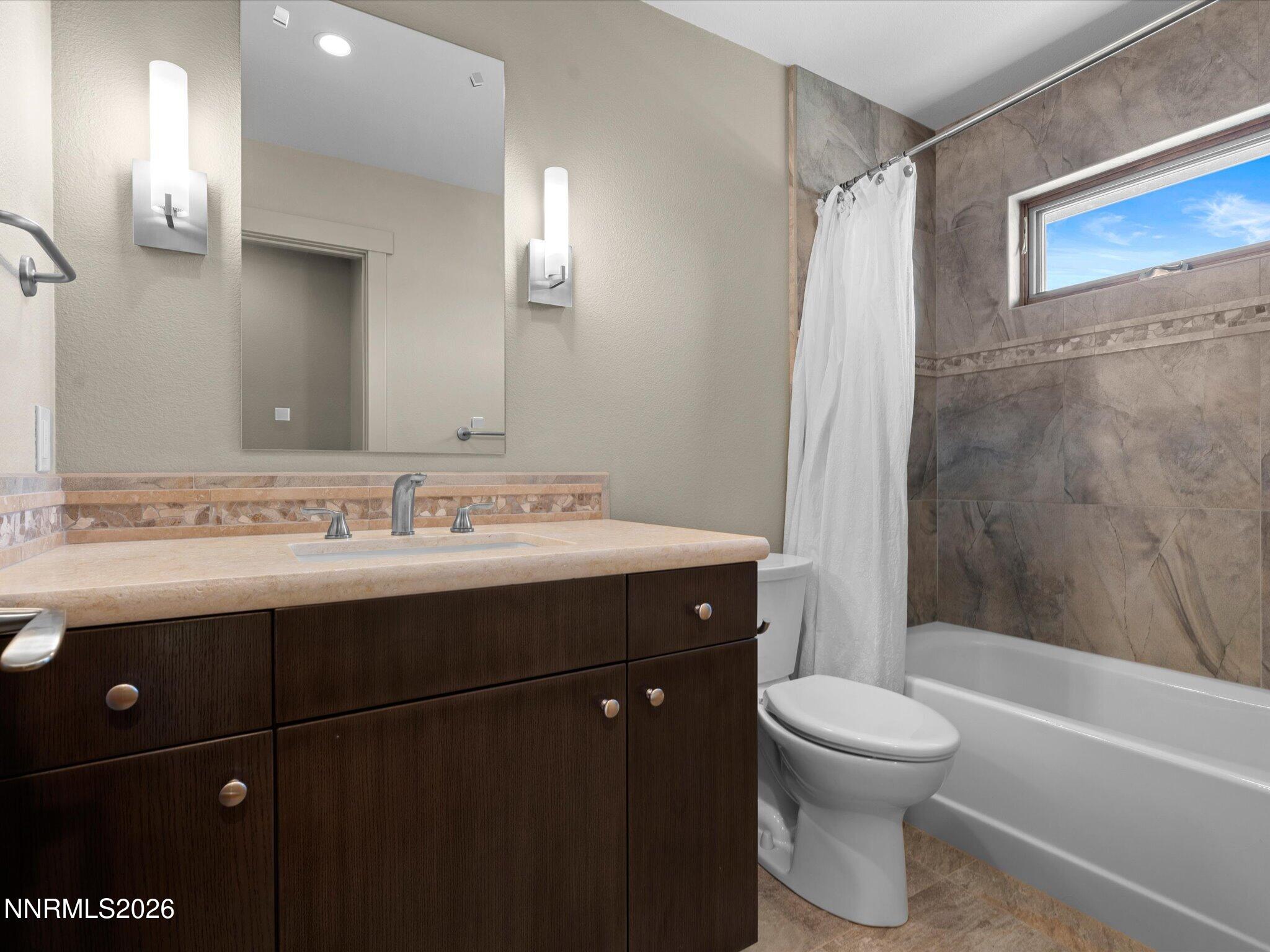 20 Connie Way Reno, NV 89521 - Photo 33 of 69 a bathroom with a sink toilet and shower