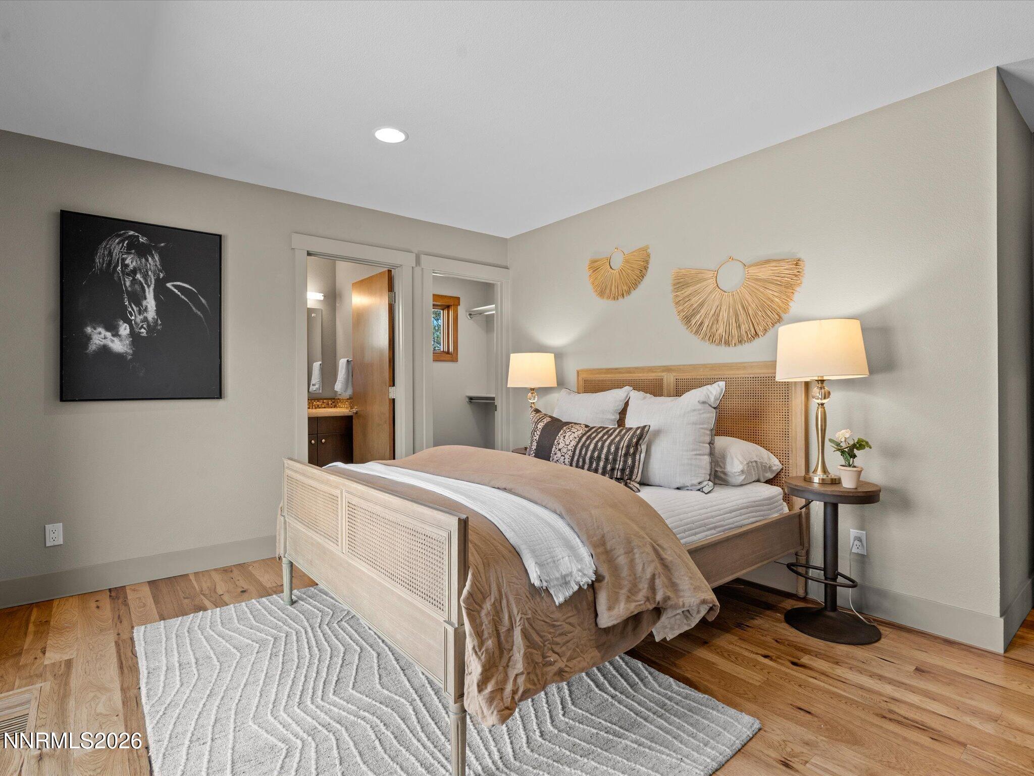 20 Connie Way Reno, NV 89521 - Photo 37 of 69 a bedroom with a bed and a lamp on table