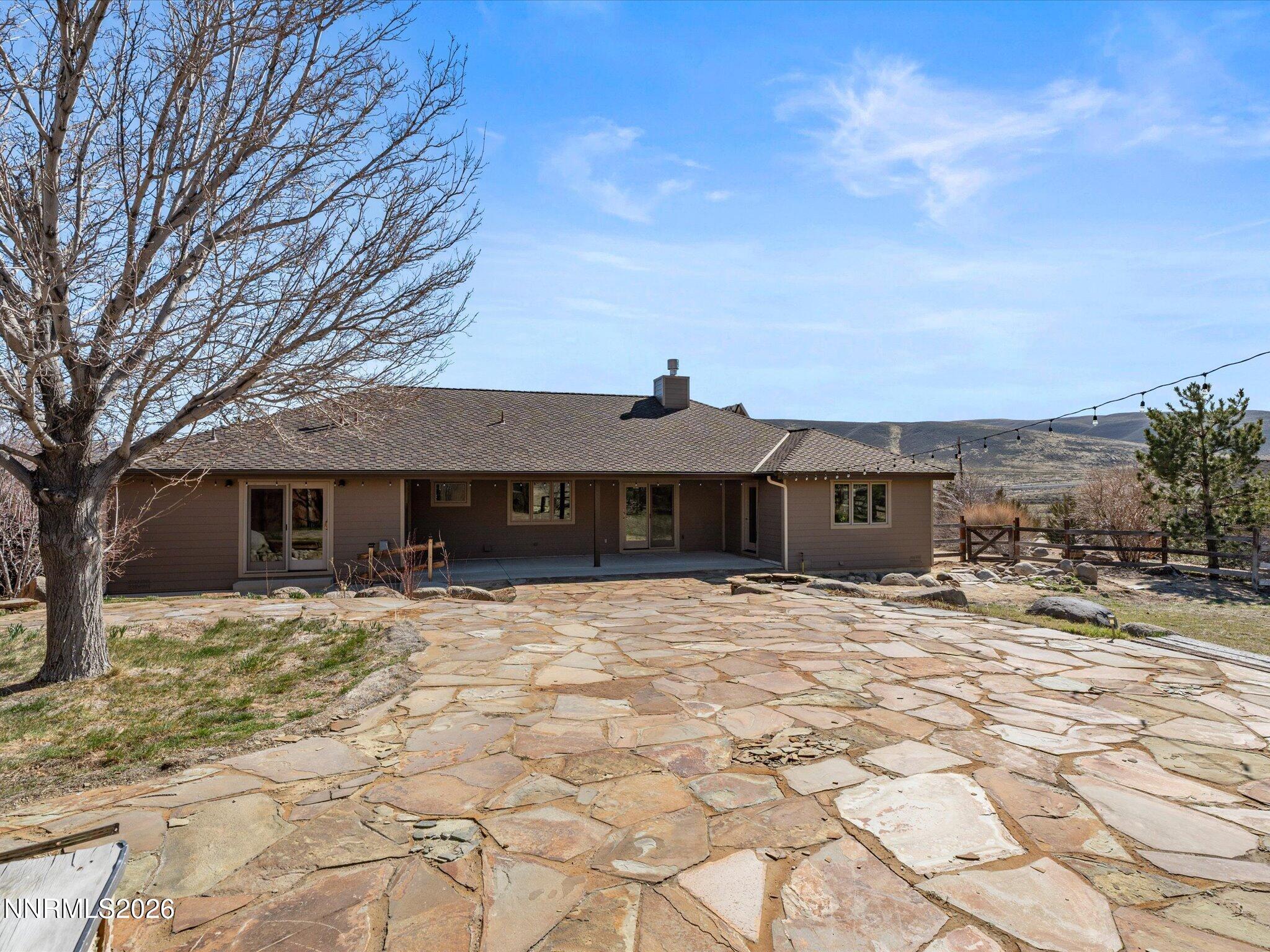 20 Connie Way Reno, NV 89521 - Photo 44 of 69 a house with yard in front of it