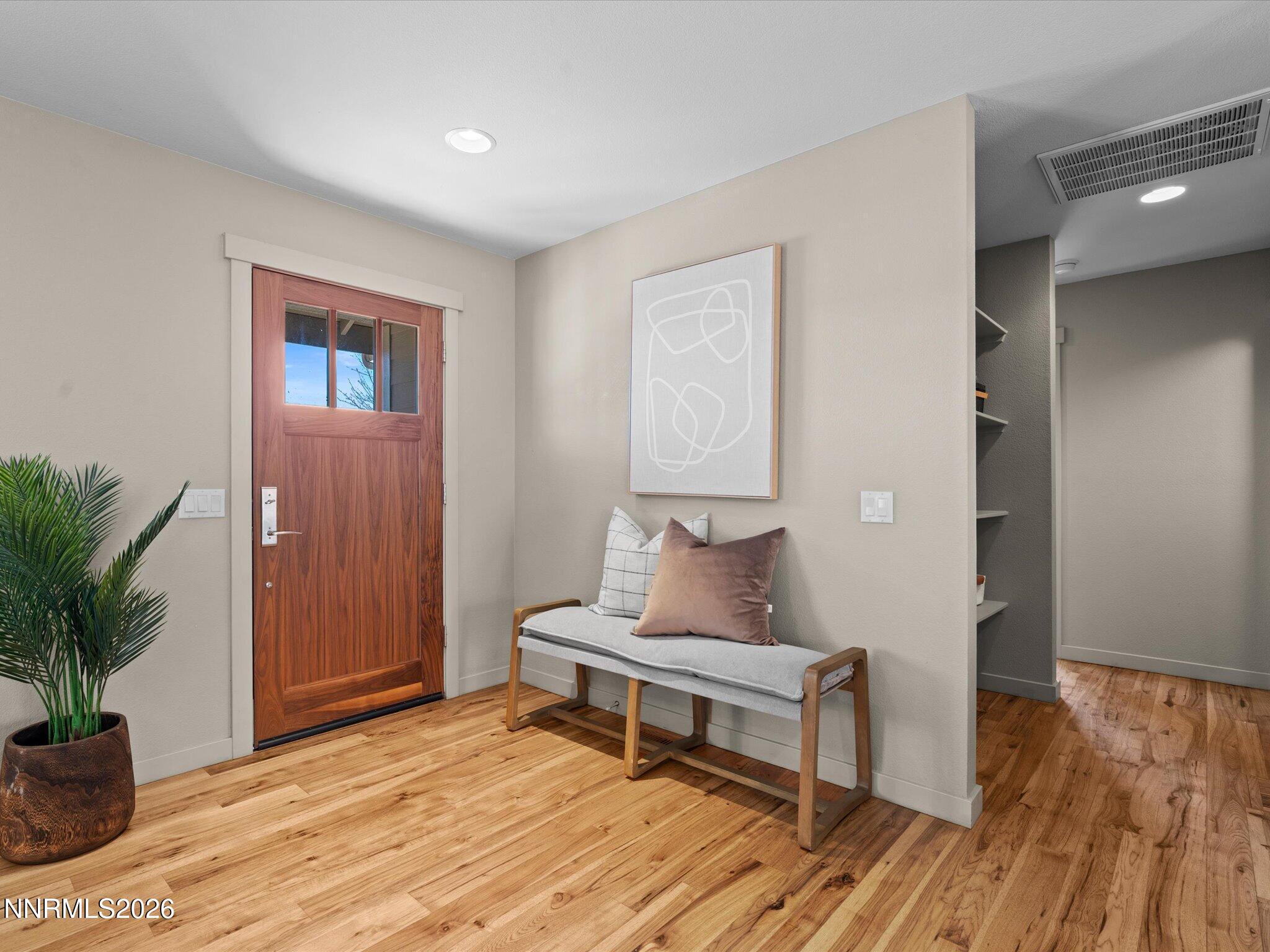20 Connie Way Reno, NV 89521 - Photo 5 of 69 a living room with furniture and a potted plant