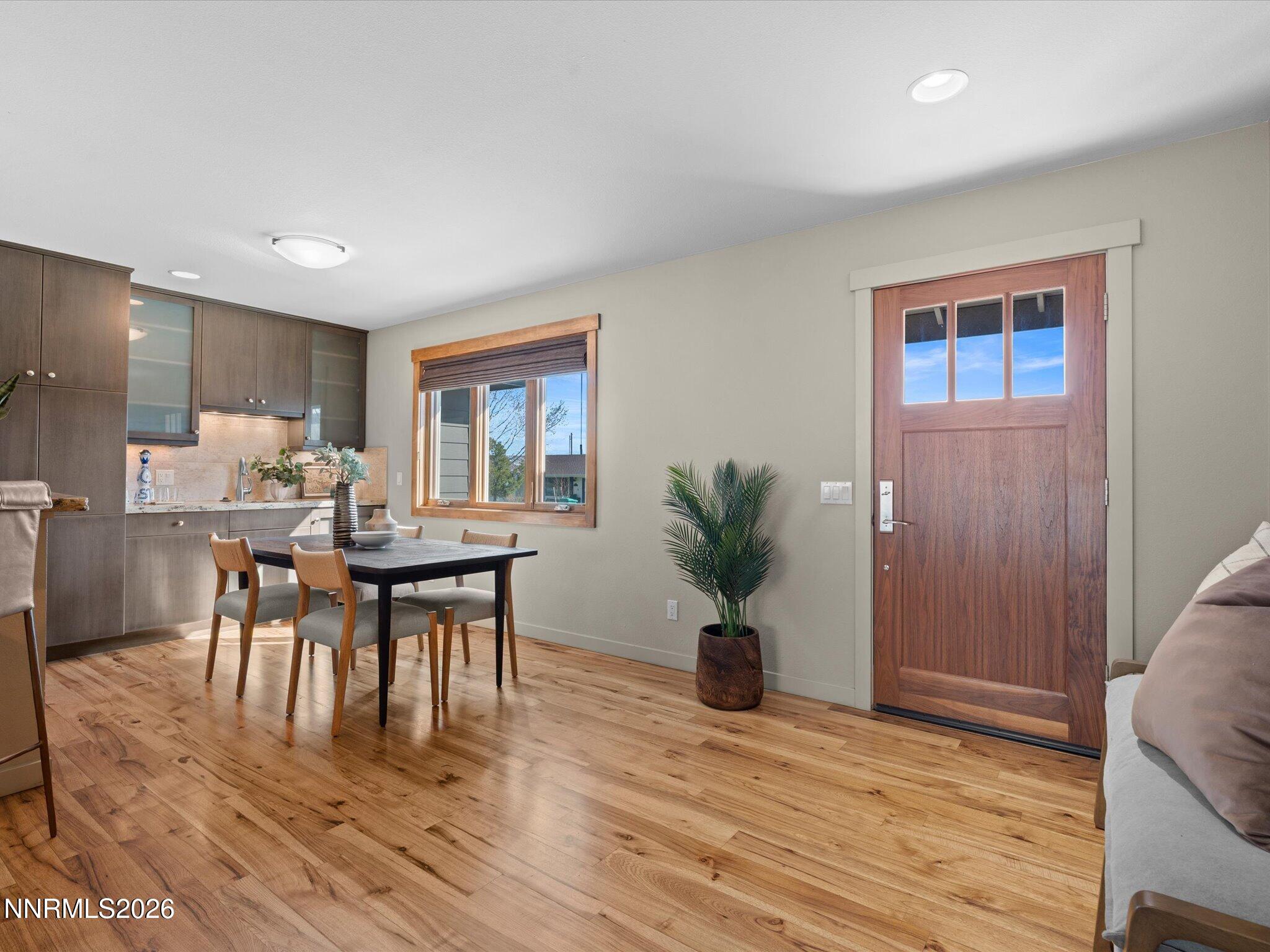 20 Connie Way Reno, NV 89521 - Photo 6 of 69 a view of a dining room with furniture and wooden floor