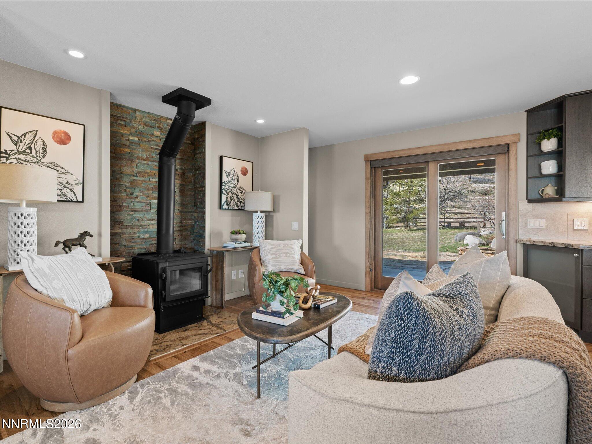 20 Connie Way Reno, NV 89521 - Photo 7 of 69 a living room with furniture and a large window