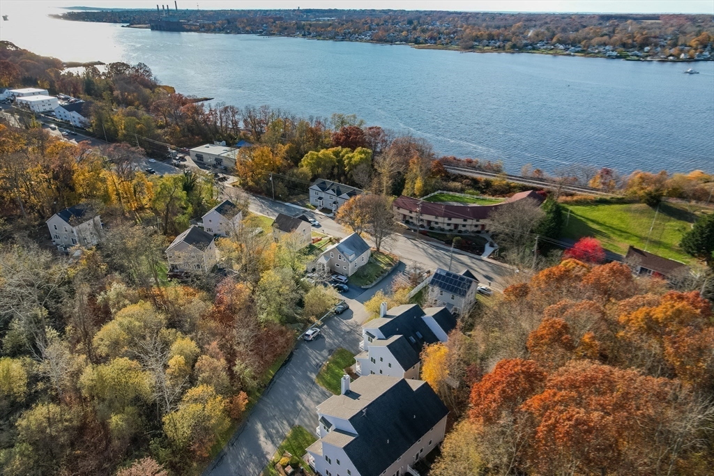 3853 North Main Street Fall River, MA 02720 - Photo 29 of 38 an aerial view of a house with a lake view