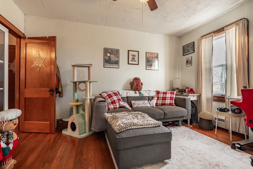 3853 North Main Street Fall River, MA 02720 - Photo 31 of 38 a living room with furniture and a window