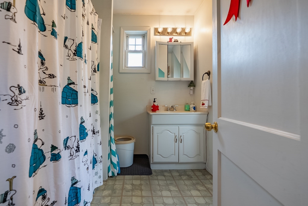 3853 North Main Street Fall River, MA 02720 - Photo 34 of 38 a bathroom with a sink toilet and shower