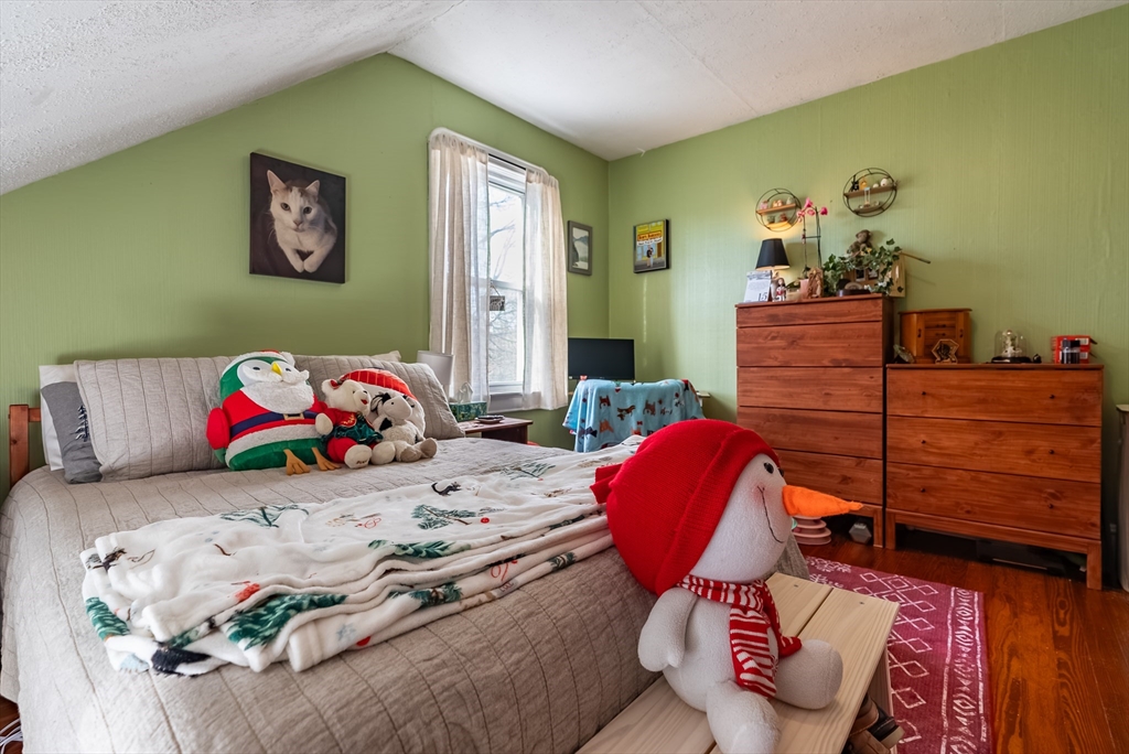 3853 North Main Street Fall River, MA 02720 - Photo 35 of 38 a bedroom with a bed and furniture