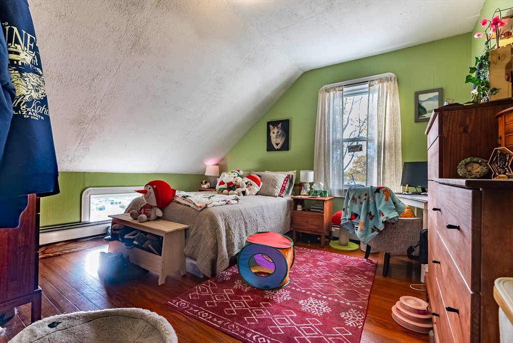 3853 North Main Street Fall River, MA 02720 - Photo 36 of 38 a bedroom with furniture and a window