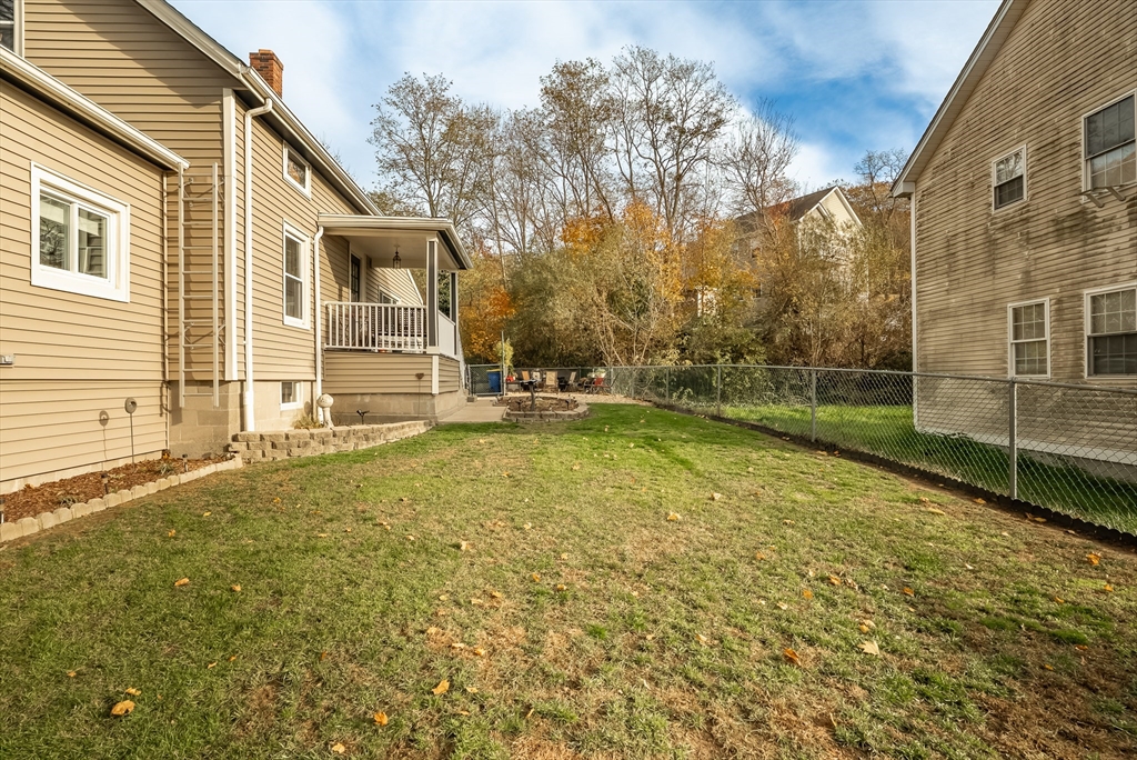 3853 North Main Street Fall River, MA 02720 - Photo 5 of 38 a view of a house with backyard and a tree
