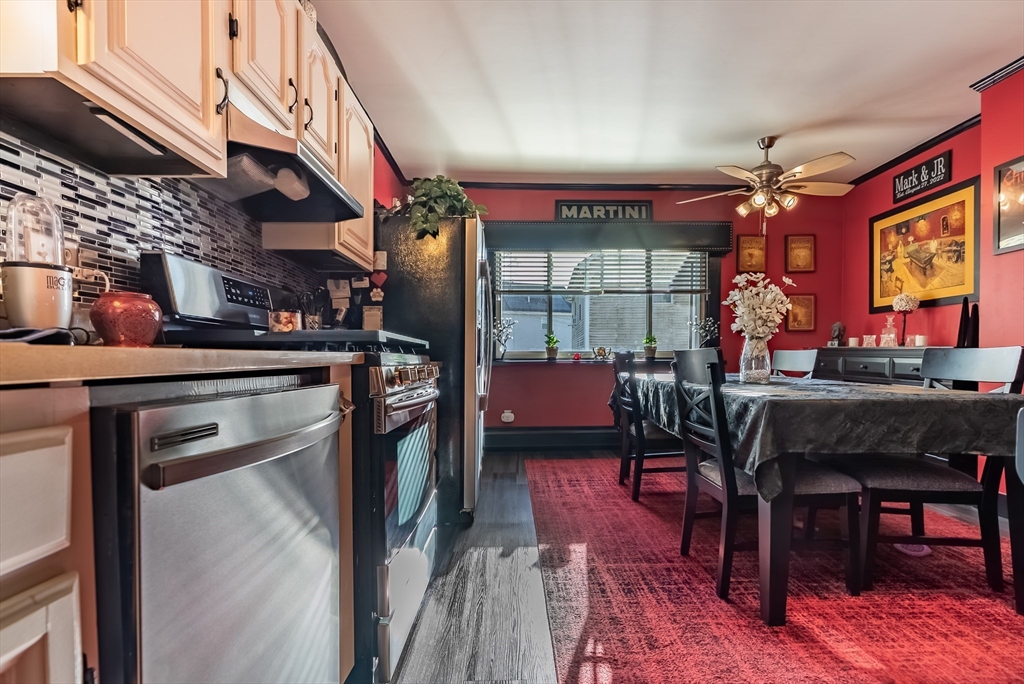 3853 North Main Street Fall River, MA 02720 - Photo 8 of 38 a view of a dining room with furniture window and wooden floor