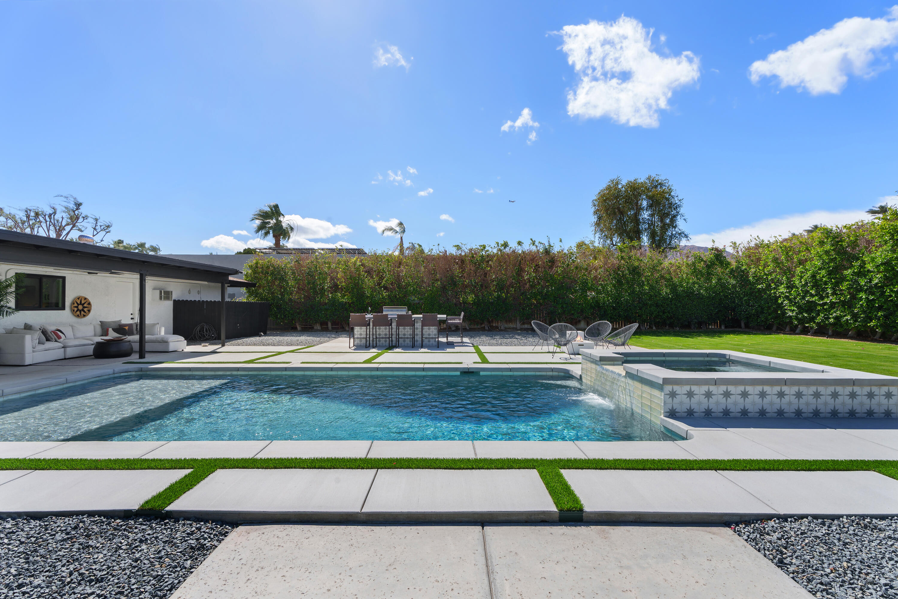 37081 Palmdale Road Rancho Mirage, CA 92270 - Photo 8 of 46 a view of a house with swimming pool