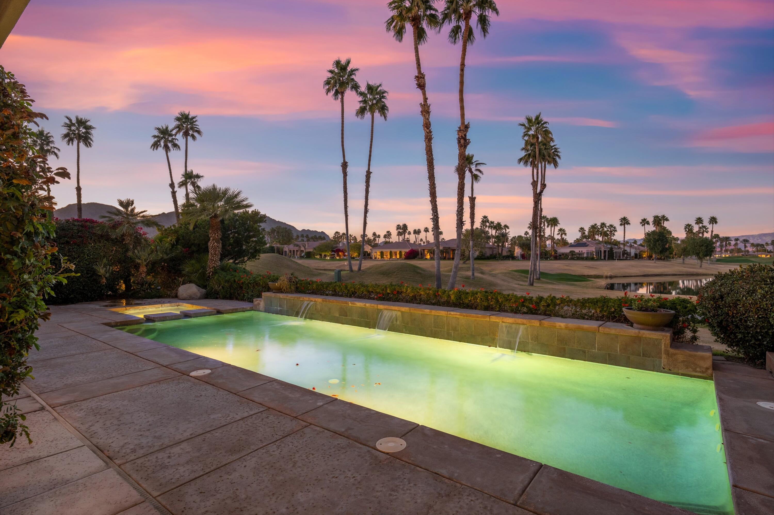 81100 Legends Way La Quinta, CA 92253 - Photo 2 of 37 a view of swimming pool with a table and chairs