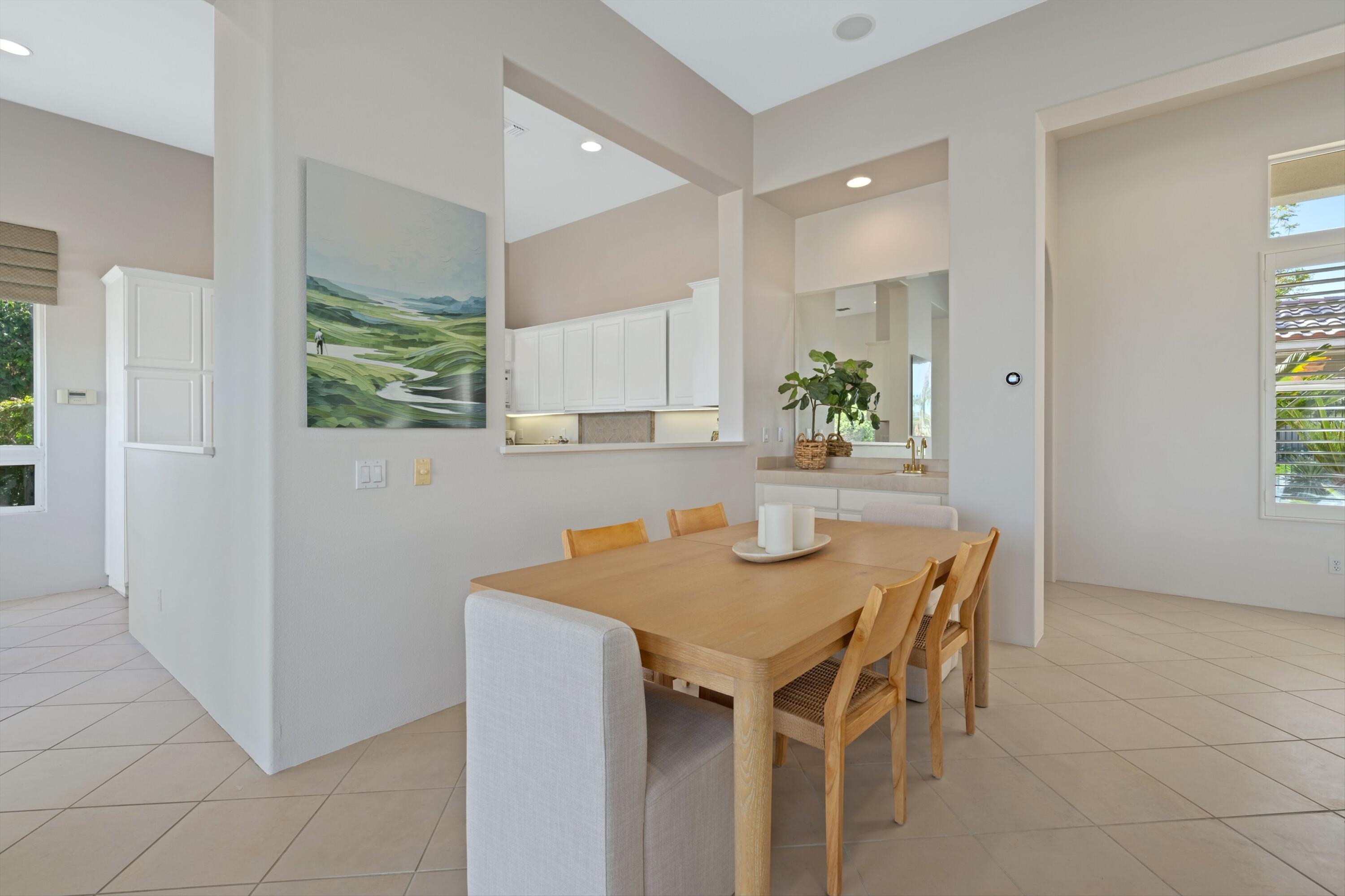 81100 Legends Way La Quinta, CA 92253 - Photo 21 of 37 a view of a kitchen and dining table